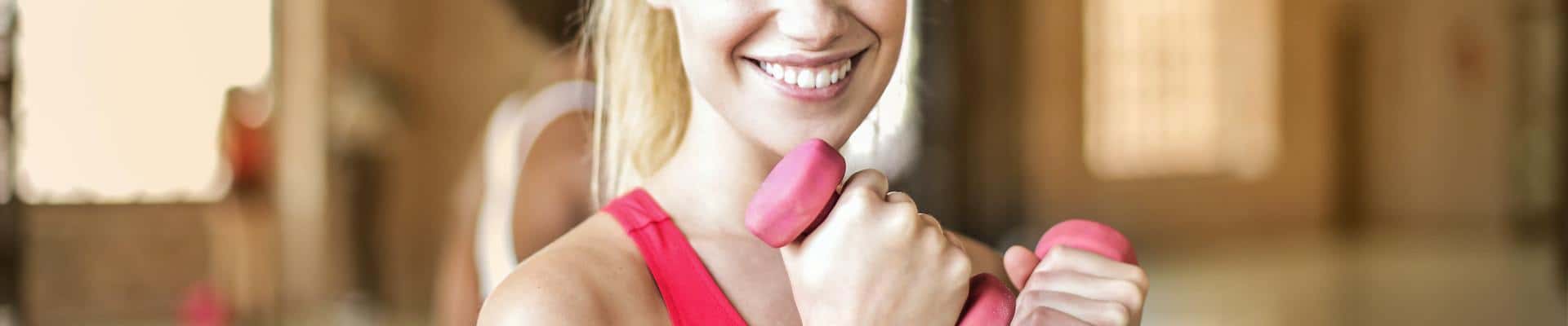 dumbells-vrouw-sporten